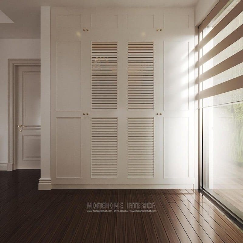 Một trong những thiết kế tủ quần áo đẹp nhìn bề ngoài tưởng cánh cửa bình thường nhưng bên trong là không gian trưng bày quần áo của gia chủ